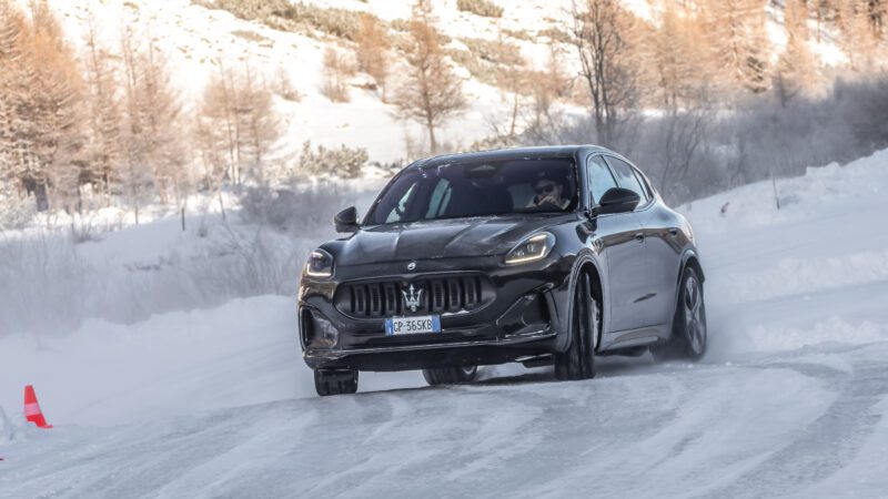 An image of a Maserati Grecale Folgore driving on an ice track.