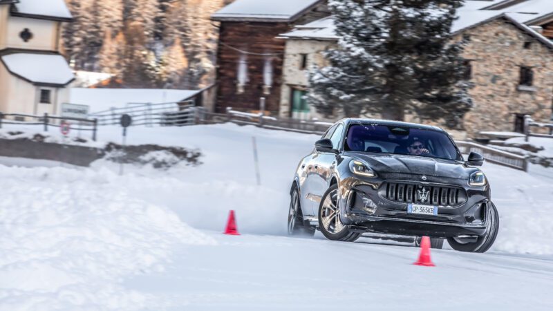 An image of a Maserati Grecale Folgore driving on an ice track.