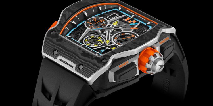 This automotive-inspired watch features a futuristic angular design with orange accents and detailed dials, all on a sleek black strap, making it a standout piece in 2024 watch releases.