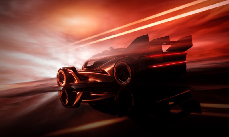 A sleek, futuristic race car with sharp angles and a glowing red design evokes the spirit of Le Mans 24 Hours as it sits against a smoky, illuminated background.