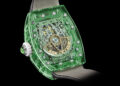 Part of the Sapphire Collection, this green transparent luxury watch showcases the intricate RM 07-02 internal mechanism with exquisite detailing against a sleek black background.