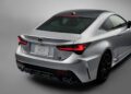 Rear view of a silver 2025 Lexus RC F Final Edition sports car, featuring sporty taillights, dual exhausts, and a sleek design on a gray background.