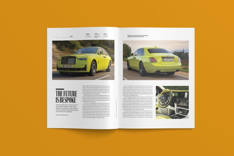 An open magazine on a mustard-colored background showcases images of a luxury yellow car, highlighting its exterior and interior design. Headline reads "The Future is Bespoke." Featured in the February 2025 issue of duPont REGISTRY, it's a testament to automotive elegance.