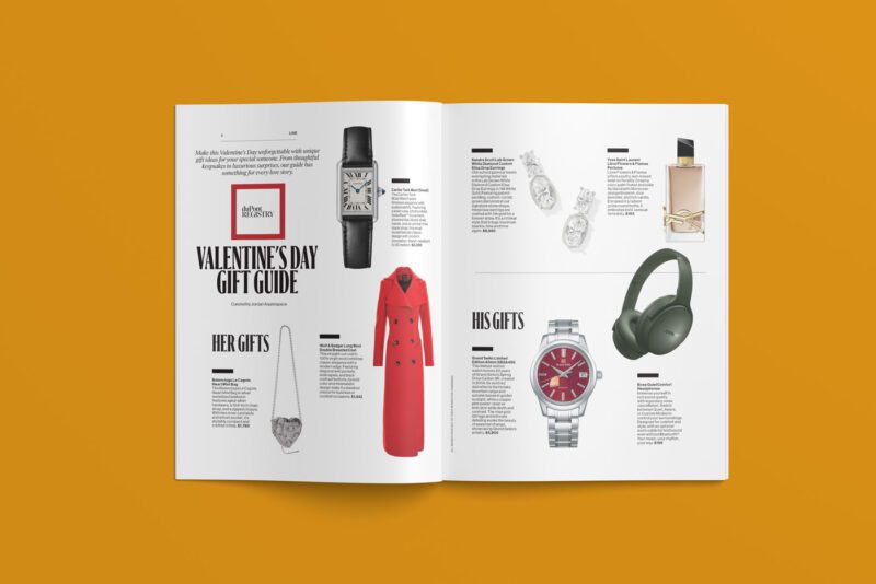 An open magazine on a yellow background showcases duPont REGISTRY's Valentine's Day gift guide for February 2025. Issue No. 477 features images of a watch, perfume, rings, a red coat, necklace, and headphones—perfect picks for the season of love.