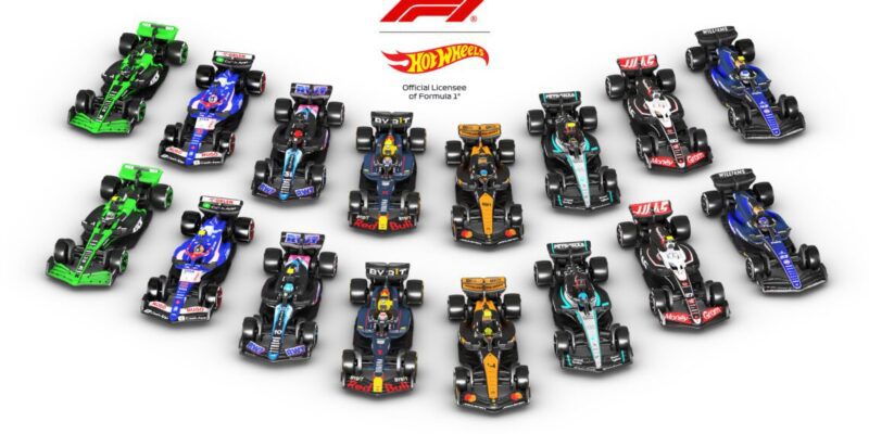 Various Hot Wheels Formula 1 toy cars are showcased in two rows, each boasting distinct colors and designs. Embracing a lifestyle of speed and elegance, the F1 and Hot Wheels logos hover above them, adding a touch of luxury to this collection.