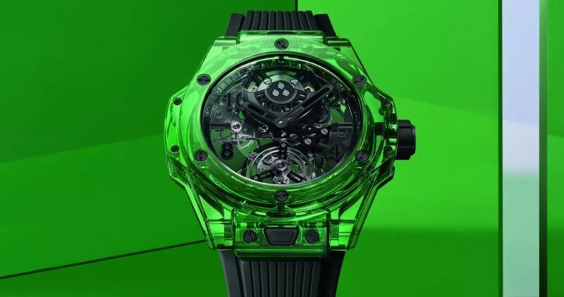 This luxury green transparent wristwatch, with visible internal gears and a sleek black strap, stands out against the vibrant green background, capturing an elegant lifestyle.