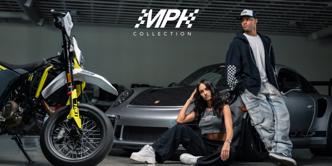 A woman sits while a man stands beside a motorcycle and a Porsche under the "Melin's New Automotive-Inspired MPH Collection" logo in the showroom.