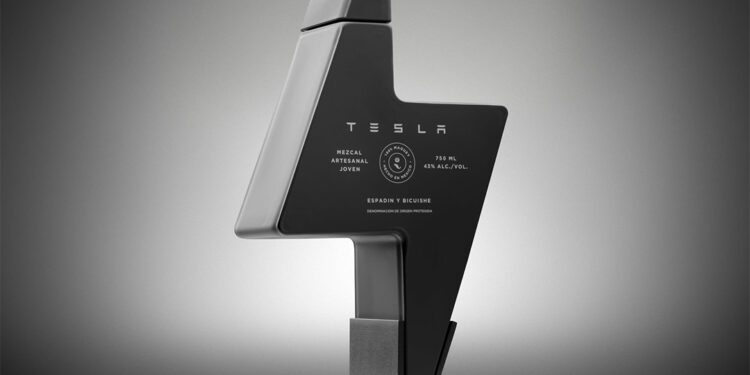 The futuristic, lightning bolt-shaped bottle boasts a "Tesla" branding and mezcal label. Its matte gray finish and minimalist design exude exclusivity, making it a limited edition piece that stands proudly on an equally angular base.