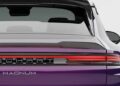 Rear view of a purple Porsche Cayenne with a black carbon fiber spoiler, featuring sleek taillights and the words "TECHART MAGNUM" elegantly displayed on the back.