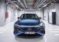 A sleek, dark gray car with "Solid State" emblazoned on the hood sits in an industrial garage with exposed pipes and cement walls, showcasing cutting-edge EV Battery Technology likely crafted by F1 Engineers.