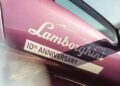 Close-up of a purple Lamborghini car door with the text "10th Anniversary" and "Polo Storico" in white, capturing the spirit of elegance akin to I.C.E. St. Moritz.