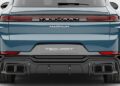 Rear view of a blue TechArt Magnum vehicle, seamlessly blending the iconic design of a Porsche Cayenne. Showcasing its sleek tail lights, dual exhausts, and distinct TechArt branding on the license plate and rear.