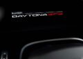Close-up of the sleek Ferrari Daytona SP3 logo displayed on a black surface, evoking the elegance of Beverly Hills.