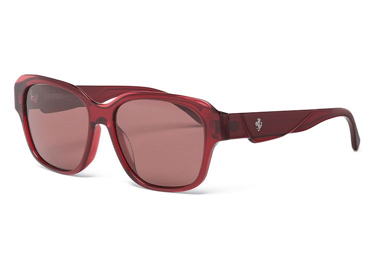Red sunglasses featuring a thick frame and dark lenses offer the ultimate driver style, complete with a small logo on the temple.