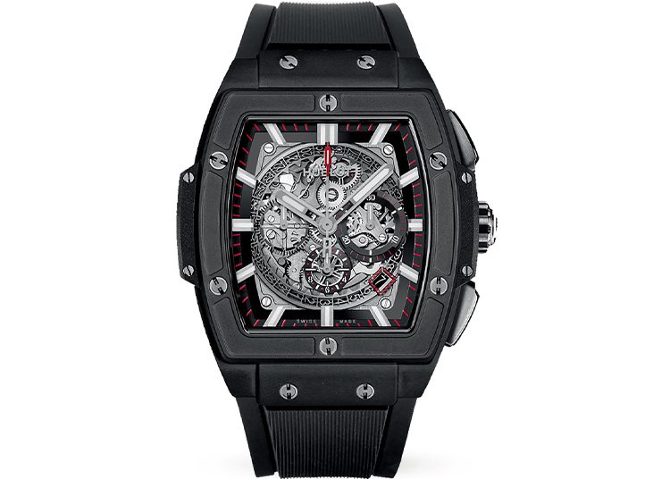 The Black Out wristwatch features a square face with a striking skeleton dial design and bold red accents, all secured on a sleek black rubber strap. Its Wheels x Wardrobe collaboration adds an exclusive edge to this standout timepiece.