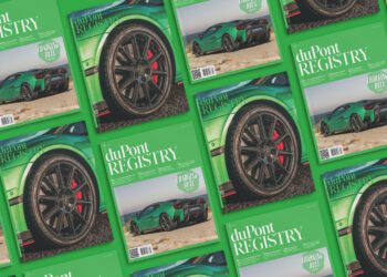 Multiple issues of duPont REGISTRY magazine, including the March 2025 edition, are arranged in a grid pattern featuring a striking green sports car.