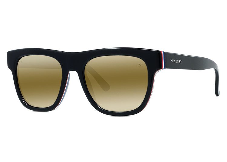 Black square luxury sunglasses with brown gradient lenses, featuring a subtle red and white trim on the temples, and the brand name "Vuarnet" on the side—designed for the ultimate driver who appreciates style and precision.