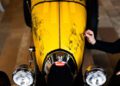 Artist Jascha Straub meticulously sketches intricate illustrations on the hood of a yellow Bugatti, channeling the spirit of Hedley Studios. His artwork turns the car into a mobile masterpiece, echoing the creativity and precision behind each curve and line.