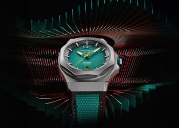 Introducing the limited edition green and silver wristwatch, a masterpiece with a textured metallic dial and geometric background pattern. This exclusive design is inspired by the prestigious Aston Martin F1 watch collection, showcasing unparalleled craftsmanship.