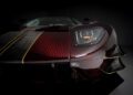 Close-up of a sleek, dark red sports car styled like a Ford GT, with a carbon fiber texture and reflective headlight, set against a dark background.