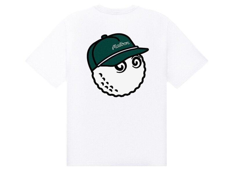 Celebrate St. Paddy's Day in style with this white T-shirt showcasing a playful cartoon golf ball with eyes, sporting a green cap emblazoned with "Malbon." It's part of the exclusive Wheels x Wardrobe collection, perfect for adding a touch of fun to your festive wardrobe.