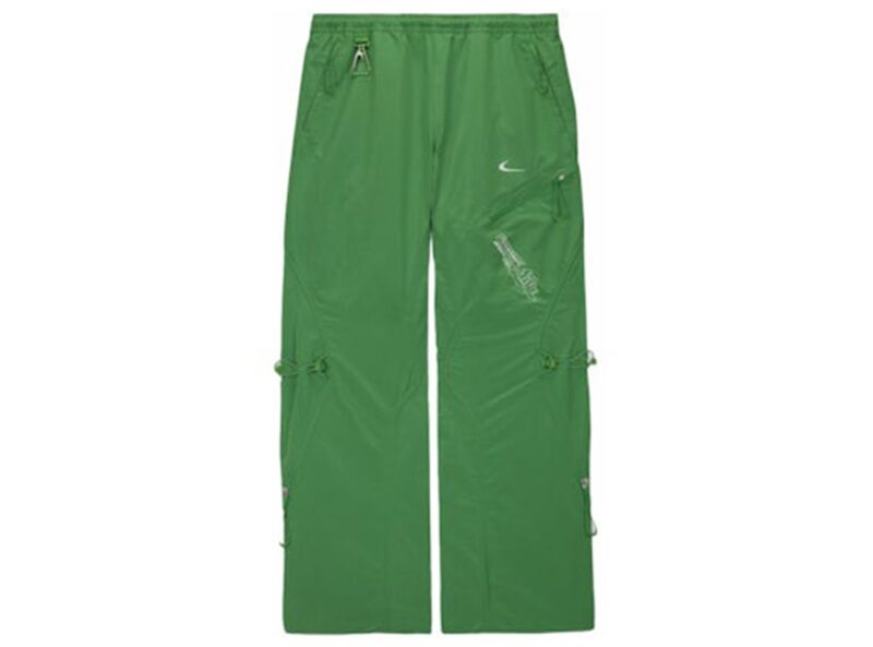 These green track pants, perfect for St. Paddy's Day, feature adjustable toggles at the knees and ankles and a small Wheels x Wardrobe logo on the right hip.