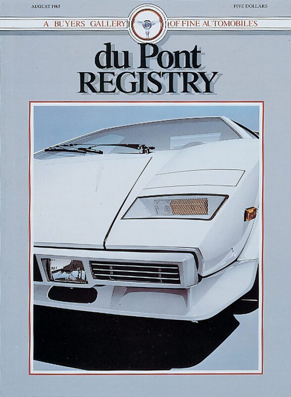 Cover of the August 1983 duPont REGISTRY magazine showcasing the front view of a white sports car, epitomizing the elegance synonymous with Cover Cars even on its 40th Anniversary.