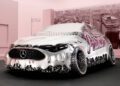 A silver Mercedes-Benz car with a melting, liquid metal effect is displayed in a pink room with "drip drip" graffiti on the side and a city view in the background.