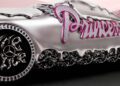 A silver Mercedes-Benz CLA with a melting effect, featuring the word "Princess" in glittery pink letters and a sleek Mercedes-Benz logo on the wheel—a true Ice Spice remix of style and attitude.