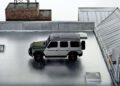 A two-tone Mercedes-Benz SUV is parked on a rooftop with a silver metallic surface, surrounded by a blend of brick and gray structures, exuding the kind of sleek sophistication you'd expect from the likes of NIGO or Moncler.