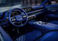 Experience the luxury of a Genesis interior, boasting navy blue leather seats and a sleek dashboard. Enjoy a steering wheel with logo, touch screen displays, and control panel—all embodying the elegance of Convertible Concepts.