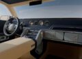 Beige and blue luxury car interior inspired by the Genesis X Gran Equator, featuring a minimalist dashboard, circular gauges, and quilted door panels—an elegant touch on this off-road concept.