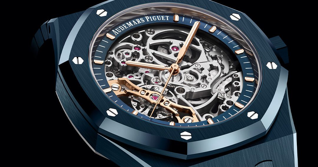 This luxury wristwatch, inspired by Audemars Piguet's Royal Oak Watches, features a visible skeleton dial revealing intricate gears. The case and bracelet, crafted from polished blue metal, add a sophisticated touch to its elegant design.