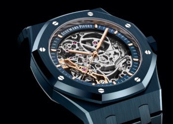 This luxury wristwatch, inspired by Audemars Piguet's Royal Oak Watches, features a visible skeleton dial revealing intricate gears. The case and bracelet, crafted from polished blue metal, add a sophisticated touch to its elegant design.
