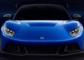 Front view of the Denza Z sportscar in blue with black accents, LED headlights, a low hood, and a dark background—showcasing its bold style and impressive 952 HP performance.
