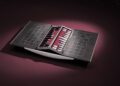 An ultra-luxury backgammon set with a black and red color scheme, featuring geometric patterns on the case and neatly arranged game pieces—crafted with the refinement of a bespoke chess set worthy of Rolls-Royce.