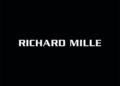 Text displaying "RICHARD MILLE" in white capital letters on a black background, reminiscent of the precision and elegance found in a Brough Superior or the sophisticated allure of an RMB 01 watch.