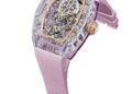 A luxury skeleton watch from the Richard Mille Sapphire Collection, featuring a transparent case, exposed mechanics, and a pink rubber strap, displayed on a white background.