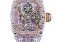 A luxury Richard Mille RM 75-01 Sapphire Collection watch featuring a transparent case, visible gears, bold purple accents, and a chic pink rubber strap.