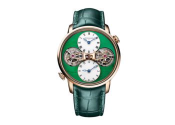 A luxury wristwatch with a green alligator strap, gold case, dual exposed tourbillons, and two white subdials for time and power reserve—an exquisite choice among the best luxury watches.
