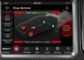Car dashboard display screen showing "Line Lock Activated" with a diagram of the brakes and drag racing options—a hallmark feature in the 2023 Dodge Challenger SRT Demon 170: A Crown Jewel No MOPAR Collector Can Ignore.
