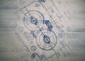 Technical blueprint showing mechanical parts with detailed measurements and engineering notes, including two large circular components—a nod to Lamborghini’s engineering legacy—and various labeled dimensions reflecting automotive history.