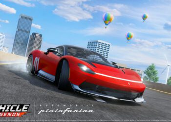 A red Battista sports car with white racing stripes drifts around a city curve in Roblox, with hot air balloons, buildings, trees, and a wind turbine in the background.