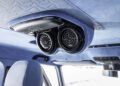 Overhead console in a vehicle interior with two circular dials—one gauge and one radar-style display—set against a blue upholstered ceiling, seen in the BRABUS XLP 800 ADVENTURE, based on the Mercedes-AMG G63.
