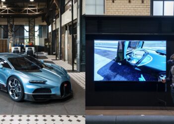 A blue hypercar sits in an industrial showroom; next to it, a person uses virtual reality gear while viewing Bugatti Design elements on a large screen.