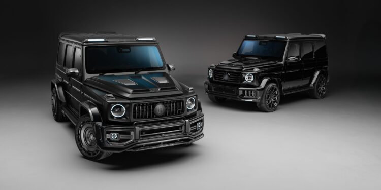 Two black luxury SUVs, including a G-Wagon with Widetrack & Aero Kits, are parked on a smooth, neutral-colored surface in an Urban Automotive-inspired studio setting with soft, even lighting.