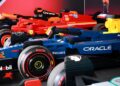 Several detailed LEGO Formula 1 race car models, inspired by Miami’s vibrant energy and sponsor logos, are displayed side by side indoors, capturing the excitement of drivable life-size F1 cars in miniature form.