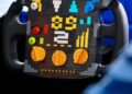 Close-up of a race car steering wheel built from LEGO bricks, inspired by drivable life-size F1 cars, featuring colorful buttons, dials, and digital-style patterns—perfect for the Miami racing spirit.