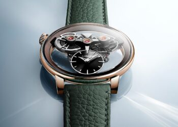 A luxury SP One Watch from the Special Projects Collection, featuring a green leather strap, rose gold case, and exposed mechanical gears displayed on a light blue reflective surface.