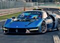 A matte blue Maserati sports car with race decals drives on a track, featuring a large rear wing and aerodynamic design elements—hinting at how Maserati will take the spotlight at 2025 FuoriConcorso with GT2 Stradale and MCXtrema.